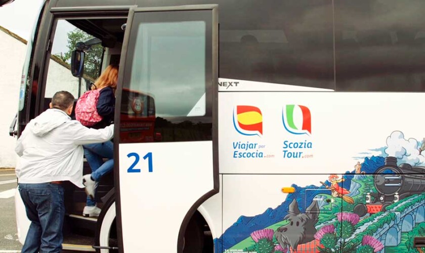 Getting on the bus during one of the tour stops